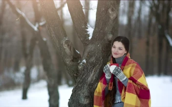 Free Stock Video Woman Enjoying A Hot Drink In The Winter Forest