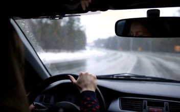 Free Stock Video Woman Driving Down A Lonely Road On A Snowy Day