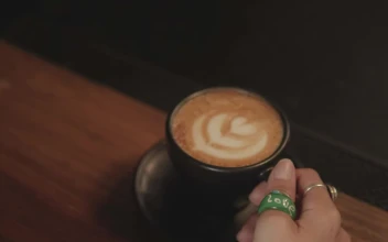 Free Stock Video Woman Drinking From A Cup Of Frothy Coffee