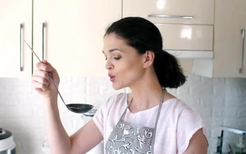 Free Stock Video Woman Cools Soup In Ladle While Cooking