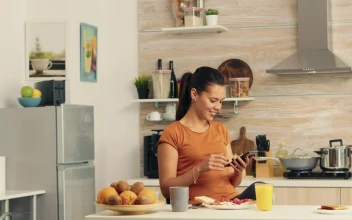 Free Stock Video Woman Checking Cell Phone During Breakfast