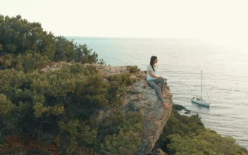 Free Stock Video Woman Admiring The Sea From A Cliff