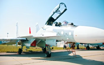 Free Stock Video White Jet Parked On A Runway In The Sun