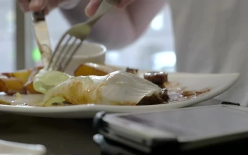 Stock Footage Woman Checking Her Phone During A Meal