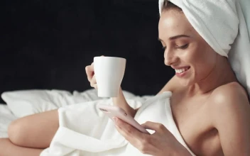 Stock Footage Woman Browsing Social Media After Shower