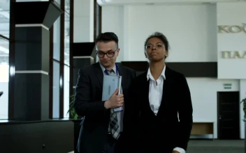 Stock Footage Woman Avoiding Journalists In The Hallway