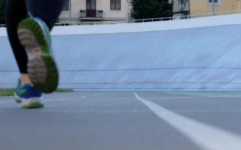 Stock Footage Woman At A Running Track Ground View