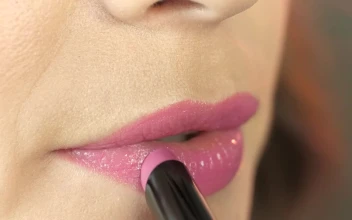 Stock Footage Woman Applying Pink Lipstick