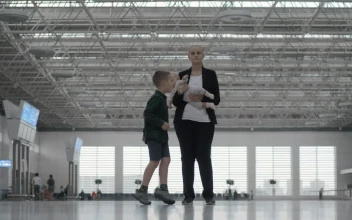 Stock Footage Woman And Her Kids At The Airport