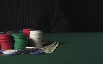 Stock Footage Winner Taking The Chips From A Poker Table
