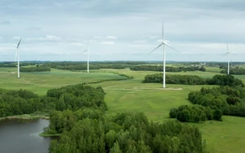 Stock Footage Wind Turbines Next To A Natural Lake