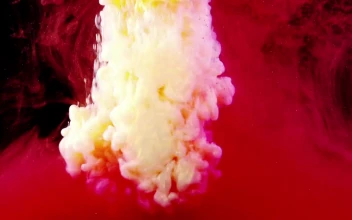 Stock Footage White Splashing Against Red