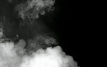 Stock Footage White Smoke Rising In The Dark