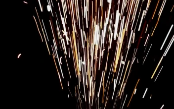 Stock Footage White And Yellow Sparks From Fireworks