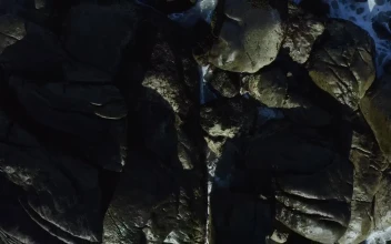 Stock Footage Waves Crash On The Rocks
