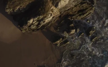 Stock Footage Waves Crash On A Cliff
