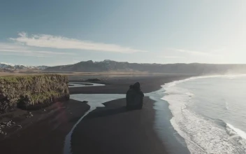 Stock Footage Waves Breaking On A Volcanic Beach
