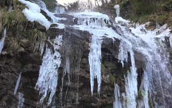 Stock Footage Waterfall On Rock With Icicles