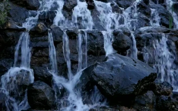 Stock Footage Waterfall On Black Rocks