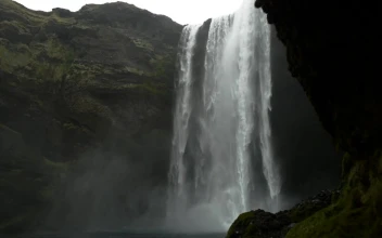 Stock Footage Waterfall Breaking Over Rocks