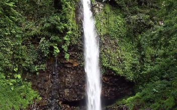 Stock Footage Waterfall Above A Cave