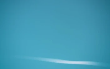 Stock Footage Water Surface On A Blue Colored Background