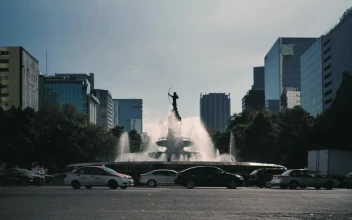 Stock Footage Water Fountain Statue At Roundabout