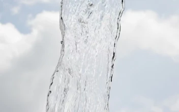 Stock Footage Water Falling With The Sky In The Background