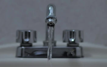 Stock Footage Water Coming Out Of A Tap In A Sink