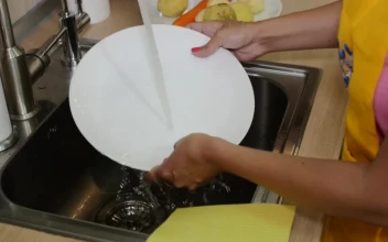 Stock Footage Washing Dishes In The Kitchen