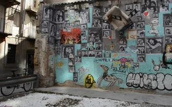 Stock Footage Wall With Portraits And Graffiti