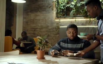 Stock Footage Waiter Bringing The Tea To The Customer