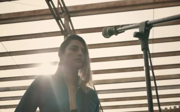 Stock Footage Vocalist And Guitarist Of A Rock Band Singing