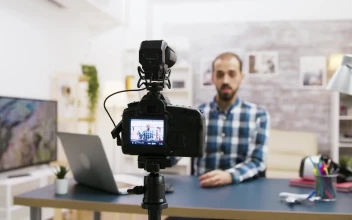 Stock Footage Vlogger Chats To Subscribers From Home Studio