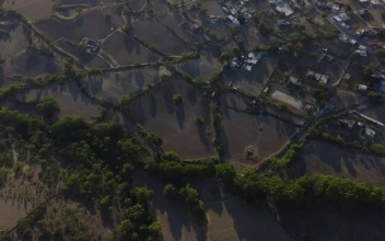 Stock Footage Village Surrounded By Fields Seen From The Air