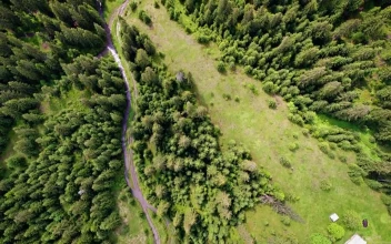 Stock Footage Village In The Mountains Tilt Aerial Shot