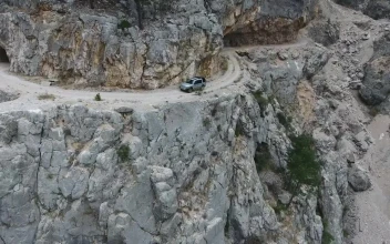 Stock Footage Vehicle Driving Through The Rocky Mountain Road