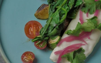 Stock Footage Vegan Looking Crepe Being Cut By Cutlery