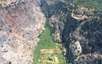 Stock Footage Valley Between Rocky Mountains And A Paradisiac Beach