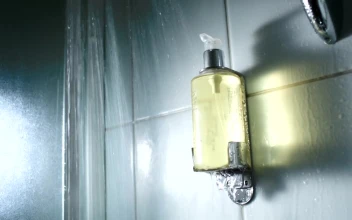 Stock Footage Using Liquid Soap In The Shower