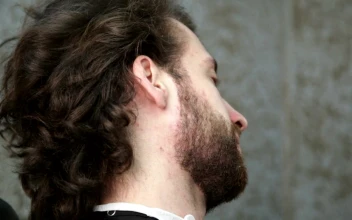 Stock Footage Using A Straight Razor To Shave A Beard