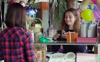 Stock Footage Using A Pin Machine In Store