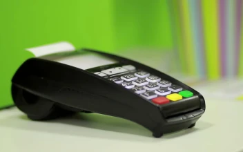 Stock Footage Using A Bank Terminal During A Card Payment
