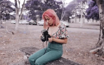 Stock Footage Urban Trendy Woman Holding An Old Photo Camera