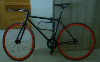 Stock Footage Urban Cyclist Going Outside His Apartment