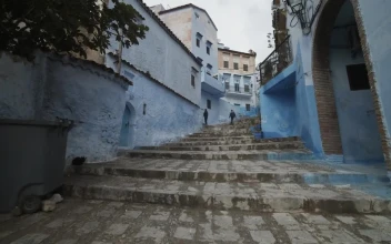 Stock Footage Up The Steps Of An Ancient Alley Painted Blue
