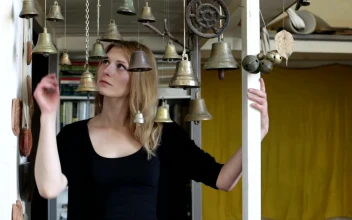Stock Footage Unhappy Woman Playing With Bells