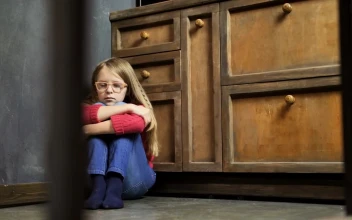 Stock Footage Unhappy Child Sitting In The Corner