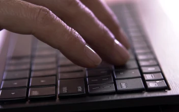 Stock Footage Typing On A Flat Keyboard