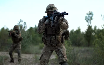 Stock Footage Two Soldiers Aiming In The Battlefield